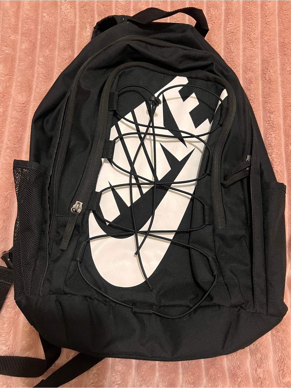 Nike Black Backpack with Large White Swoosh and Front Bungee